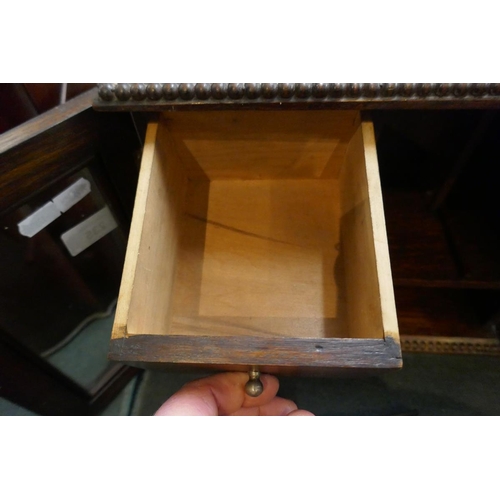 235 - Edwardian glazed oak smokers cabinet with contents