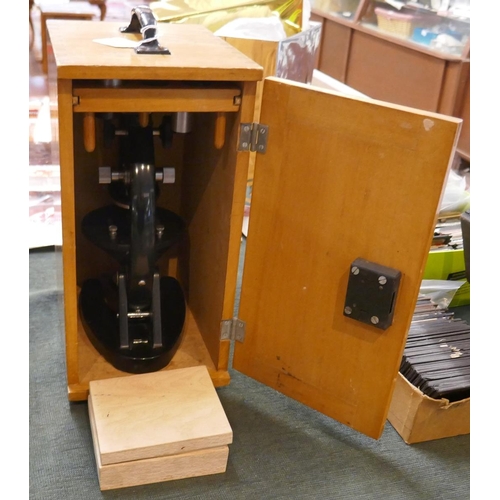 236 - Microscope in original box with spare lens