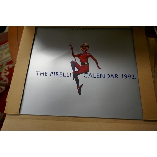 288 - 10 Pirelli Calendars - various years together with Pirelli caledar album