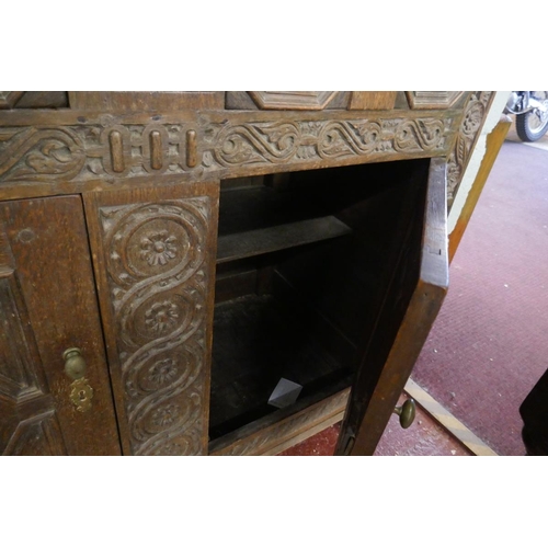 314 - Antique carved oak cupboard  - Approx size: W: 107cm D: 55cm H: 161cm