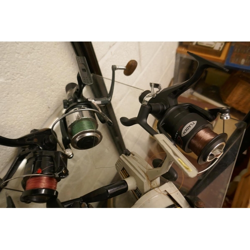 339 - Collection of 9 fishing reels