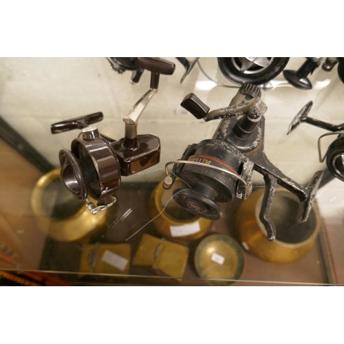 339 - Collection of 9 fishing reels