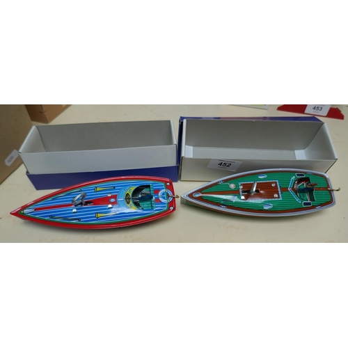 452 - 2 wind up tin plate toy speedboats