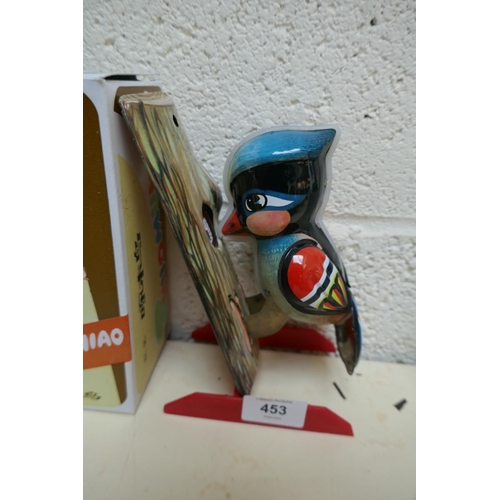 453 - Wind up tin plate toy penguin and woodpecker