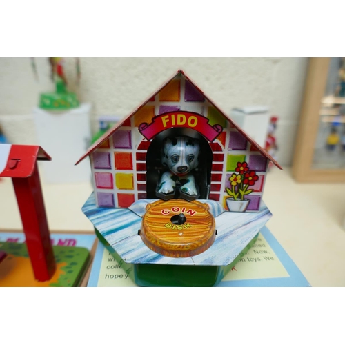 455 - Wind up tin plate toys - Fido money bank and Animal Playland