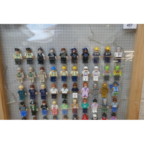 457 - Framed Lego style figures together with approx 175 marbles