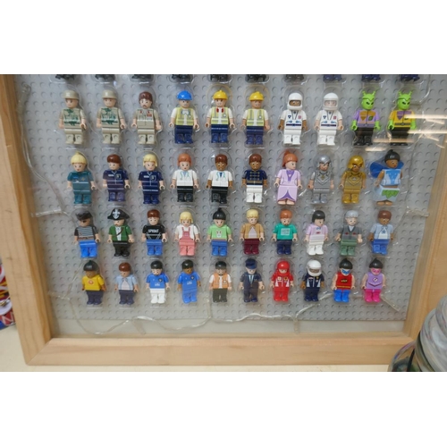 457 - Framed Lego style figures together with approx 175 marbles