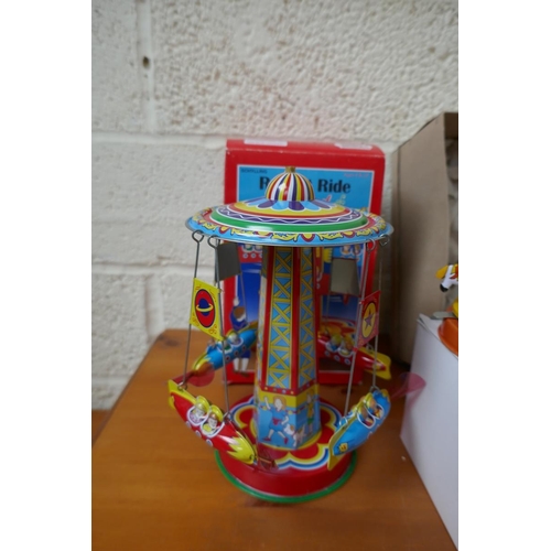 458 - Wind up tin plate toys - Fairground Rides