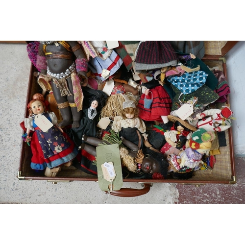 459 - Collection of vintage dolls in suitcase