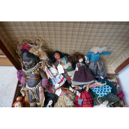 459 - Collection of vintage dolls in suitcase