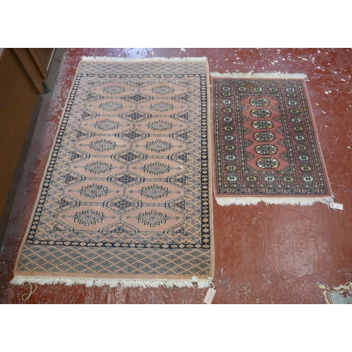 491 - 2 Bokhara style hand woven rugs