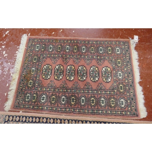 491 - 2 Bokhara style hand woven rugs