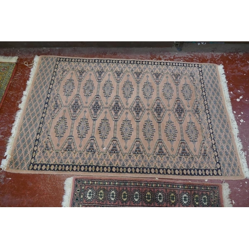 491 - 2 Bokhara style hand woven rugs