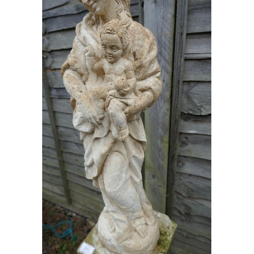 513 - Stone statue of mother and child on stone pedestal - Approx height: 129cm