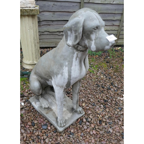 516 - Large stone dog garden ornament - Approx height: 72cm