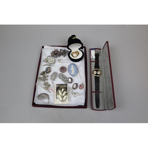 65 - Collection of costume jewellery to include silver and boxed watch