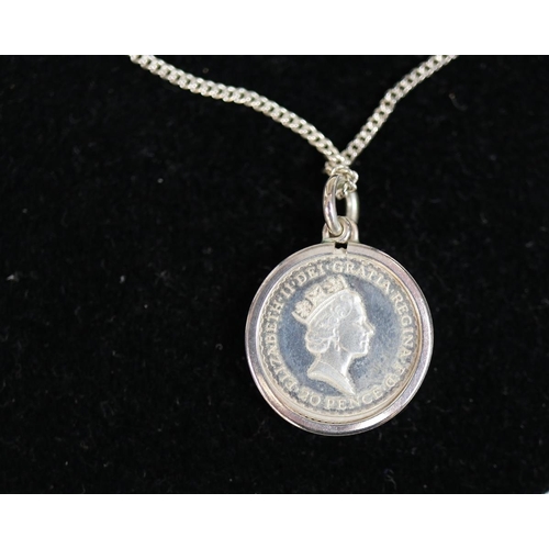 82 - Britannia silver pendant on chain with COA together with white metal Queen Elizabeth II commemorativ... 