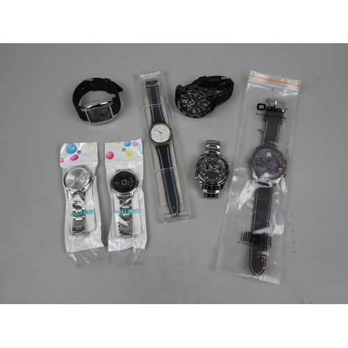 88 - Collection of men's watches to include Swatch Loomi with original box and documentation