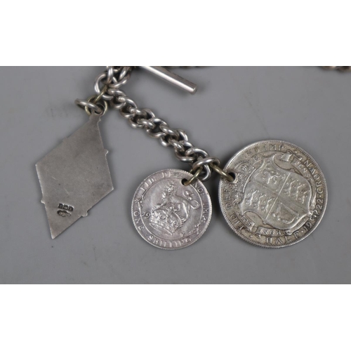 92 - Hallmarked silver Albert chain with silver coins and silver fob - Approx gross weight 89g