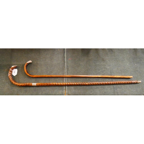 246 - Two silver tipped walking canes