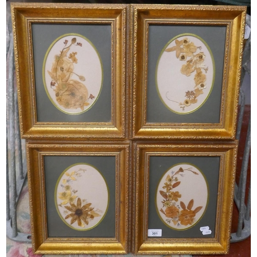 301 - Set of 4 gilt framed pressed flowers