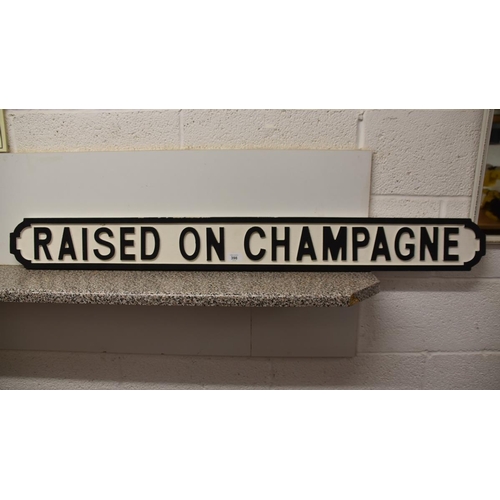 398 - Wooden sign 'Raised On Champagne'