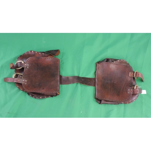 406 - Pair of leather paniers