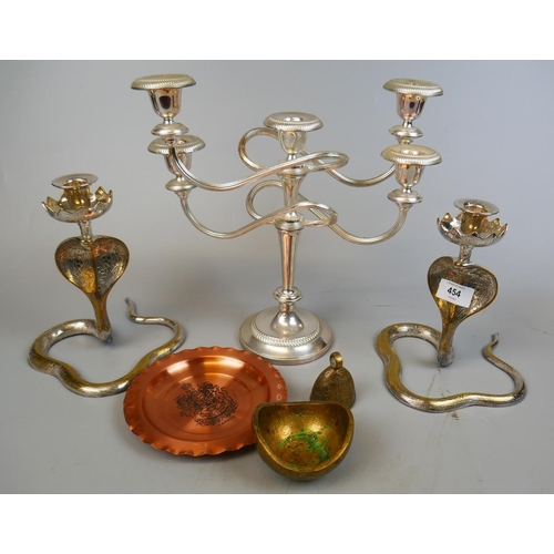 454 - Collection of metalware to include a pair of cobra candlesticks