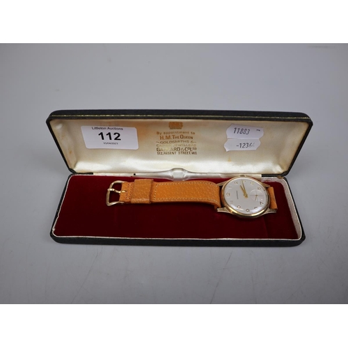 112 - 1950's 9ct gold Garrard watch in working order