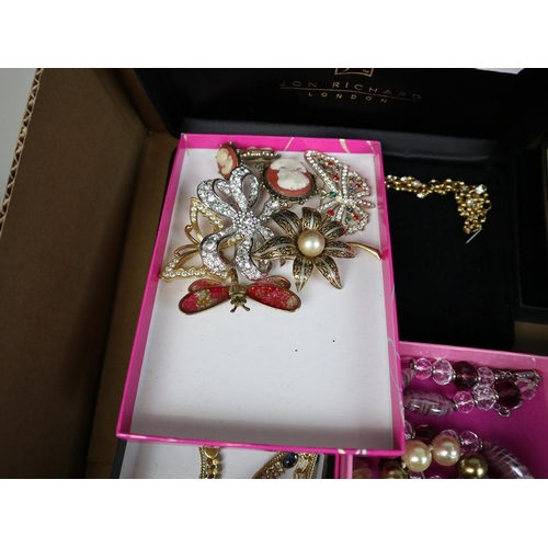 104 - Large collection of costume jewellery to include brooches, watches etc