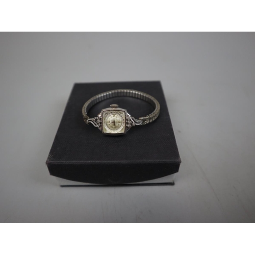 109 - Ladies Gruen 17 jewelled 6 diamond watch on 10k rolled white gold