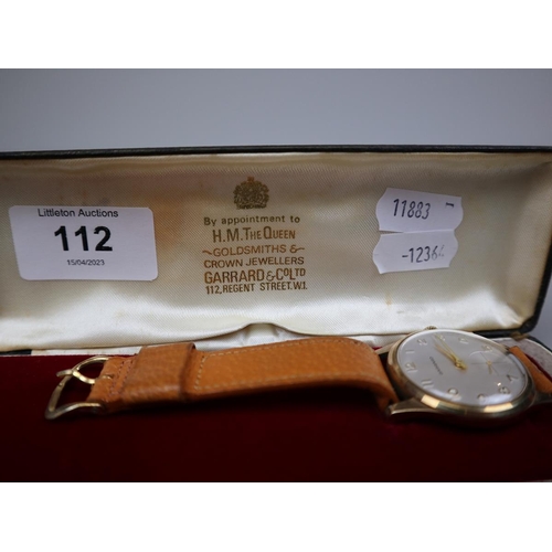 112 - 1950's 9ct gold Garrard watch in working order