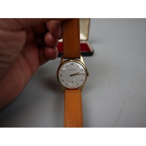 112 - 1950's 9ct gold Garrard watch in working order