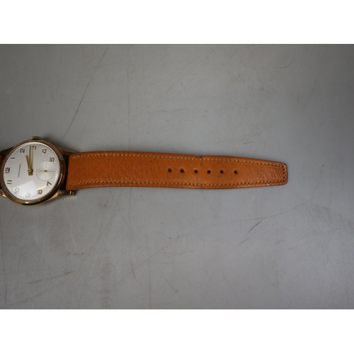 112 - 1950's 9ct gold Garrard watch in working order