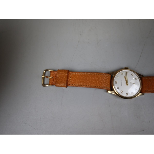 112 - 1950's 9ct gold Garrard watch in working order