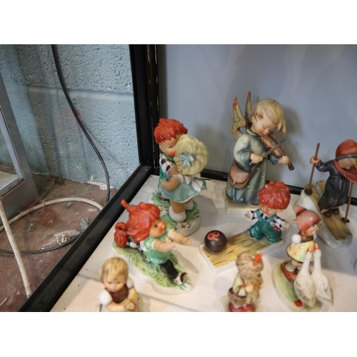 198 - Collection of Hummel figurines