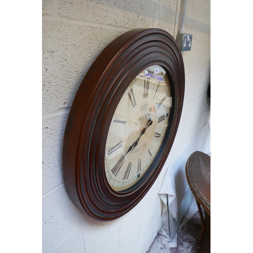 437 - Large wall clock marked Opera