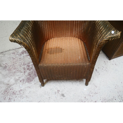 438 - Lloyd Loom chair with cabinet