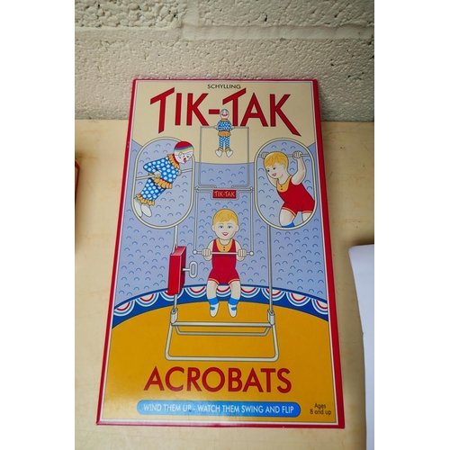 447 - Tik-Tak acrobat tin plate trapeze 