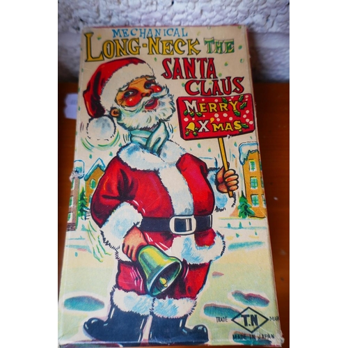 449 - Mechanical long neck Santa Clause in original box