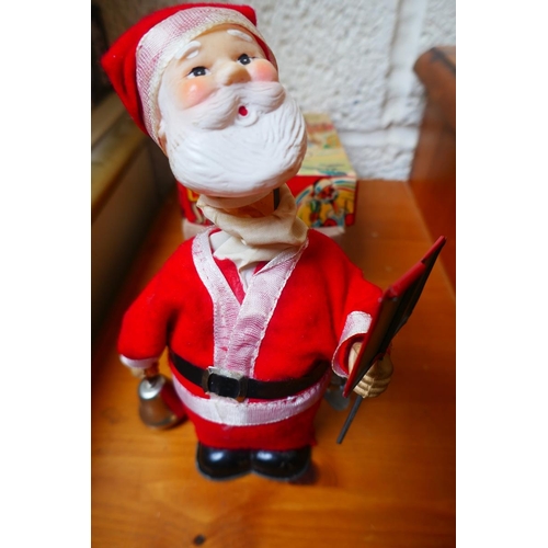 449 - Mechanical long neck Santa Clause in original box