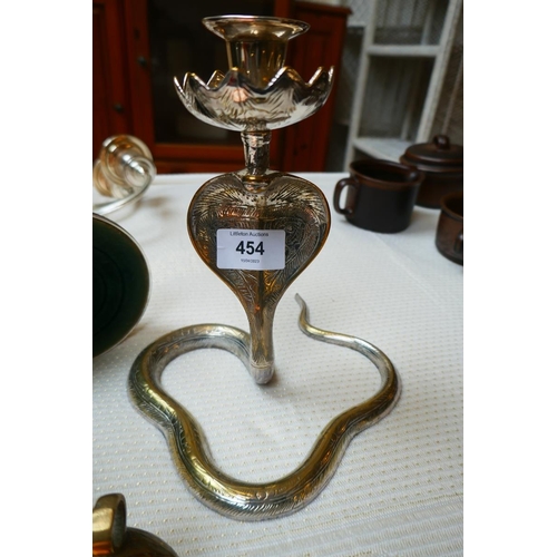 454 - Collection of metalware to include a pair of cobra candlesticks