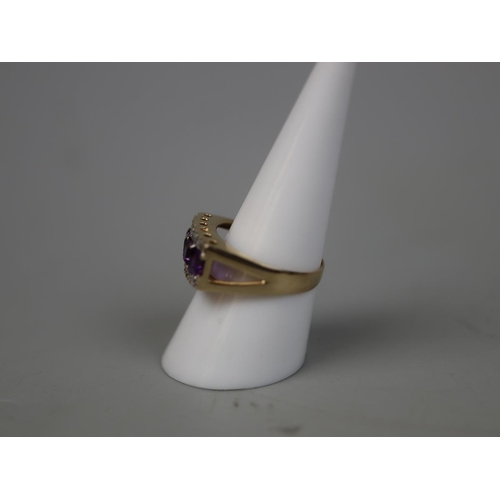 72 - 9ct gold amethyst & diamond set ring - Size P½