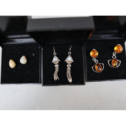 83 - Collection of moonstone, opal and amber earrings on silver