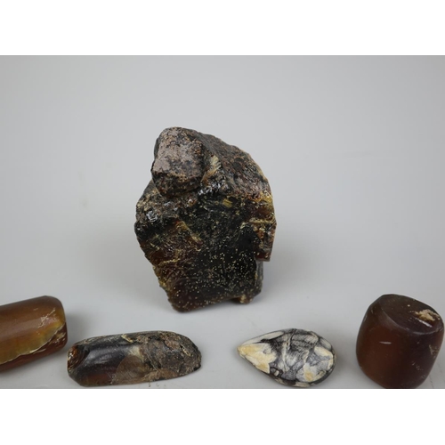 92 - Collection of raw amber to include Indonesian blue