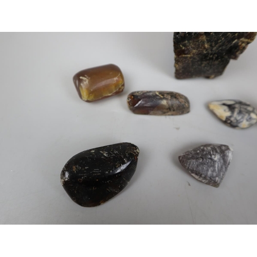 92 - Collection of raw amber to include Indonesian blue