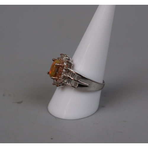 98 - Ladies Ethiopian wello orange opal dress ring on silver - Size R