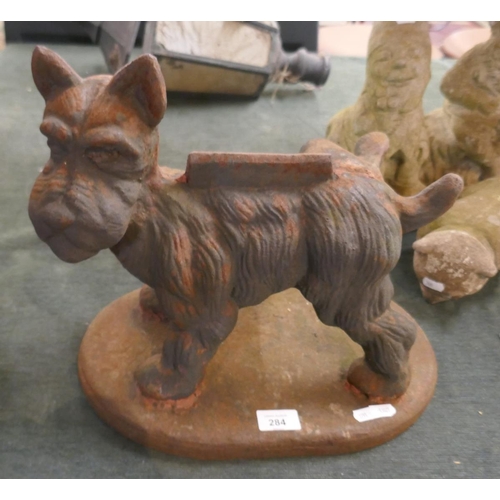 284 - Cast iron boot scraper in the form of a dog relieving himself