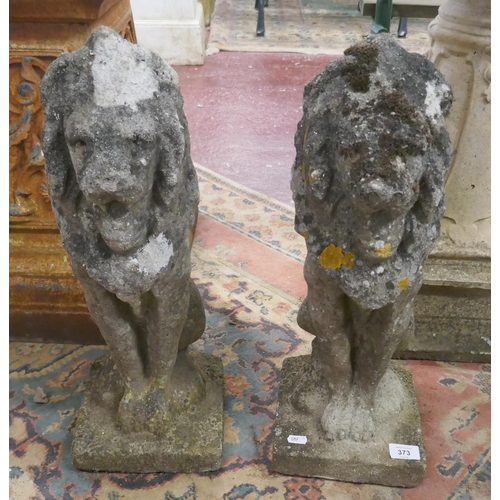 373 - Pair of stone lions - Approx height: 57cm