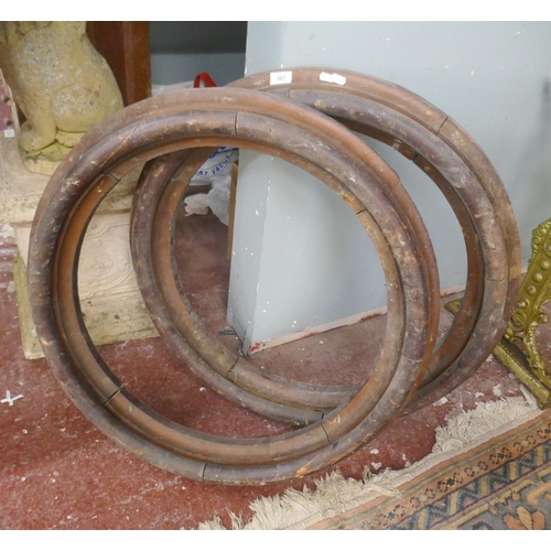 387 - Pair of 19thC stained pine round window frames